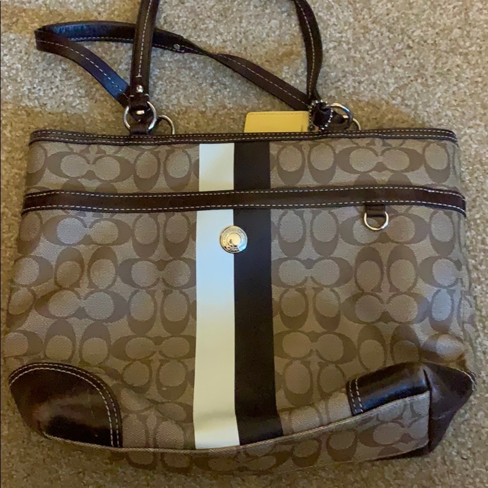 Brown Coach bag with front stripe
